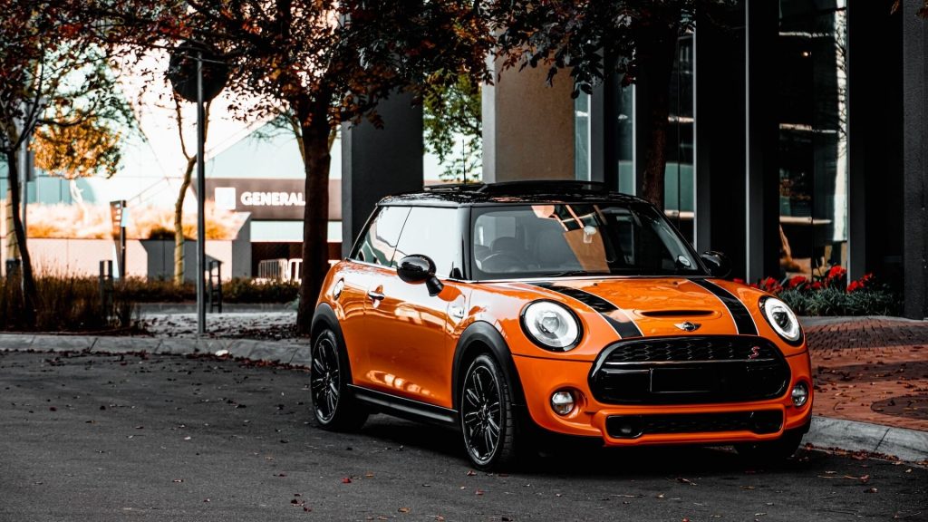 A compact and stylish Mini Cooper, emblematic of British automotive charm and efficiency.